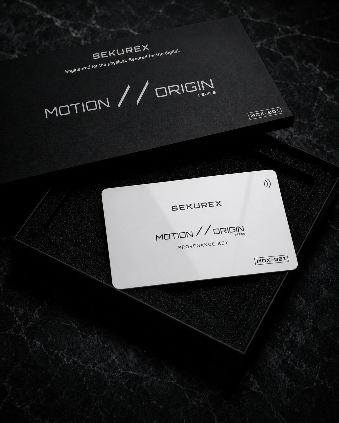 SEKUREX Motion // Origin presentation box with the white MOX-001 provenance key seated in foam