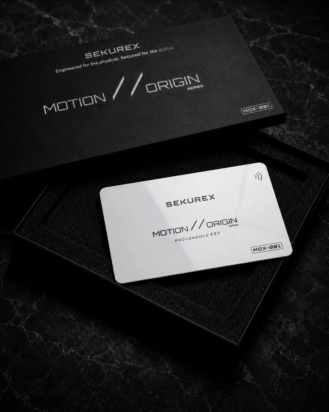 SEKUREX Motion // Origin presentation box with the white MOX-001 provenance key seated in foam